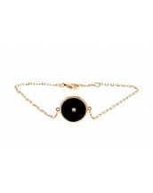 Bracelet with black onyx amulet and a diamond in 18 K gold